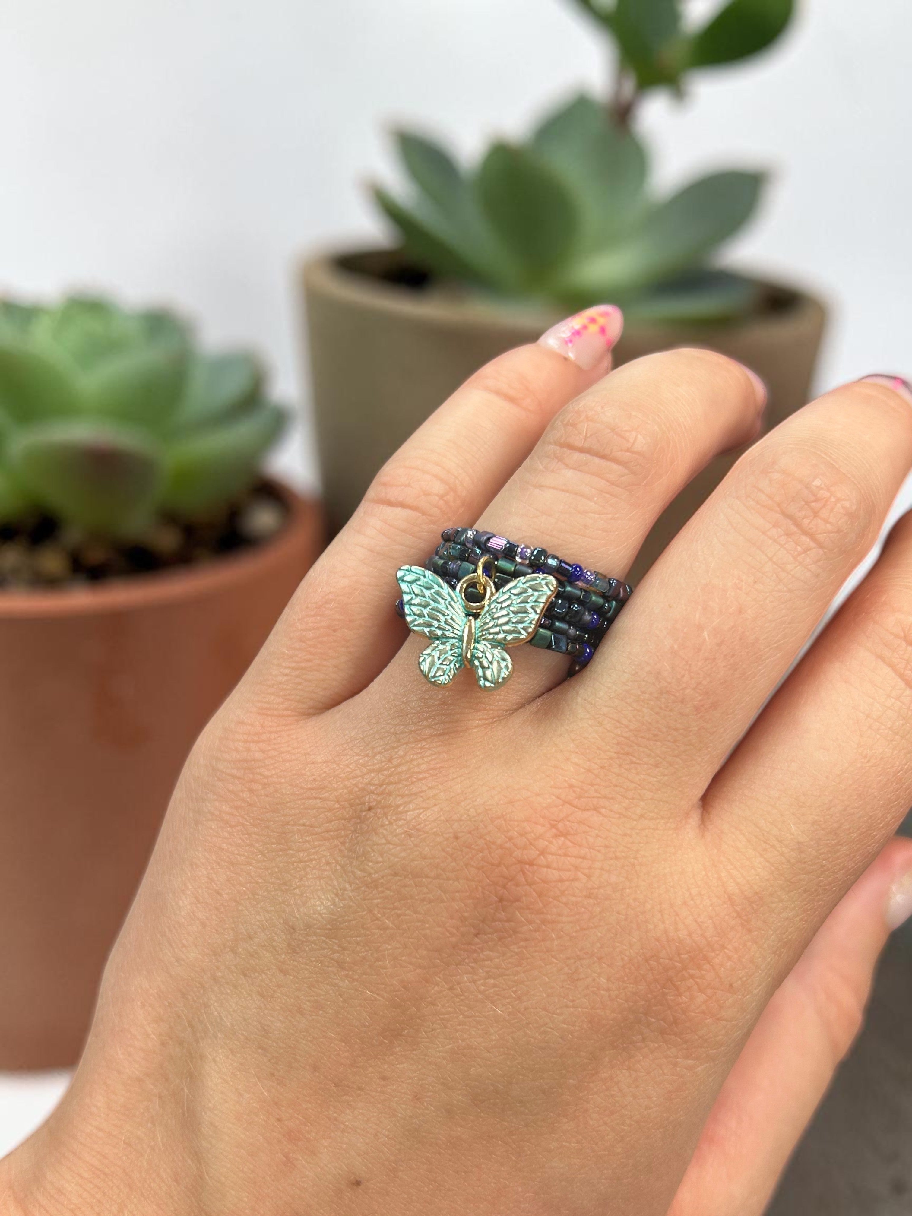 Iridescent Deep Multicolored Beaded Spiral Ring with Aqua Butterfly Charm | Unique Handmade Jewelry