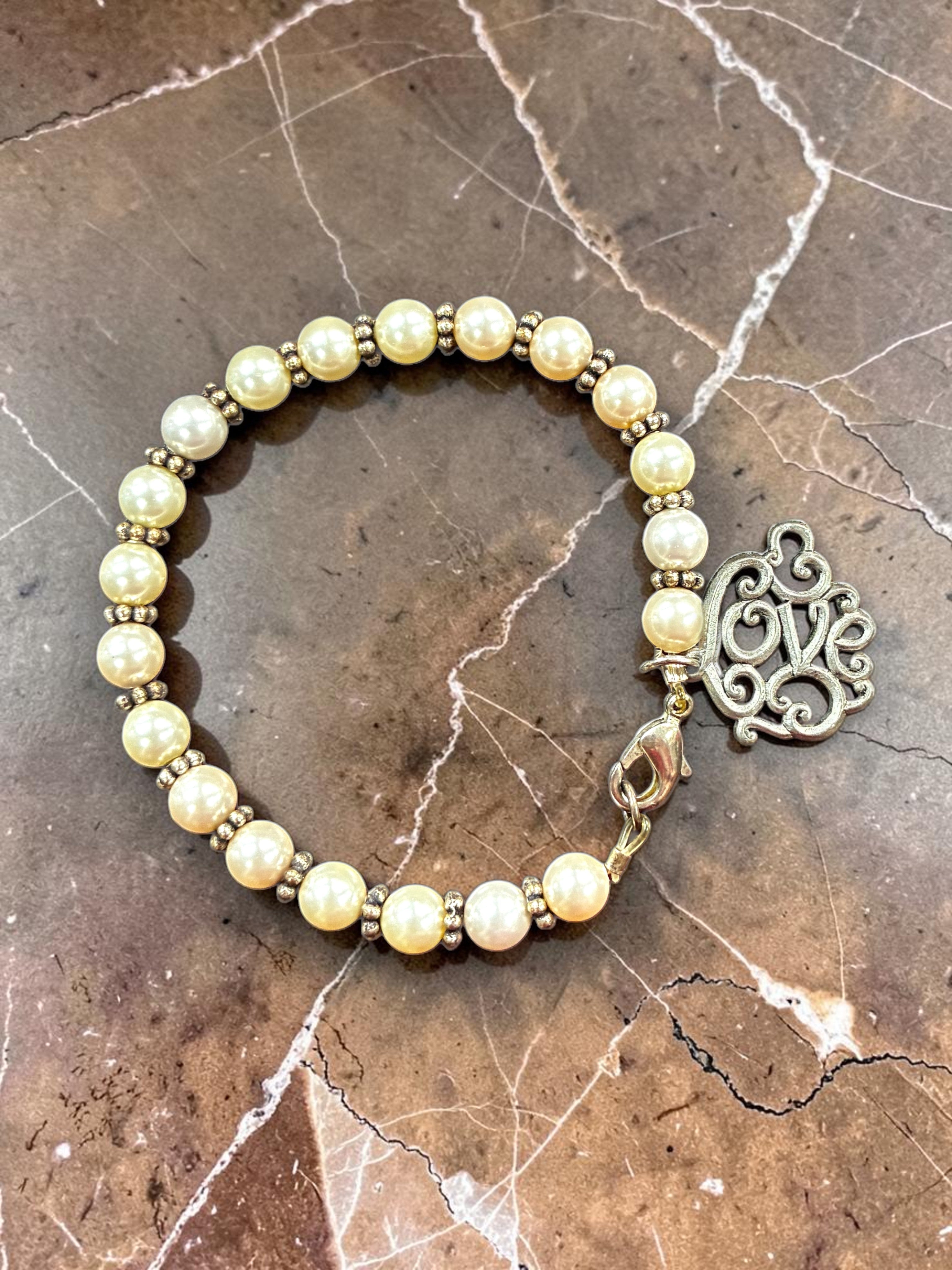 Elegant Pearl Charm Bracelet with Decorative Love Pendant