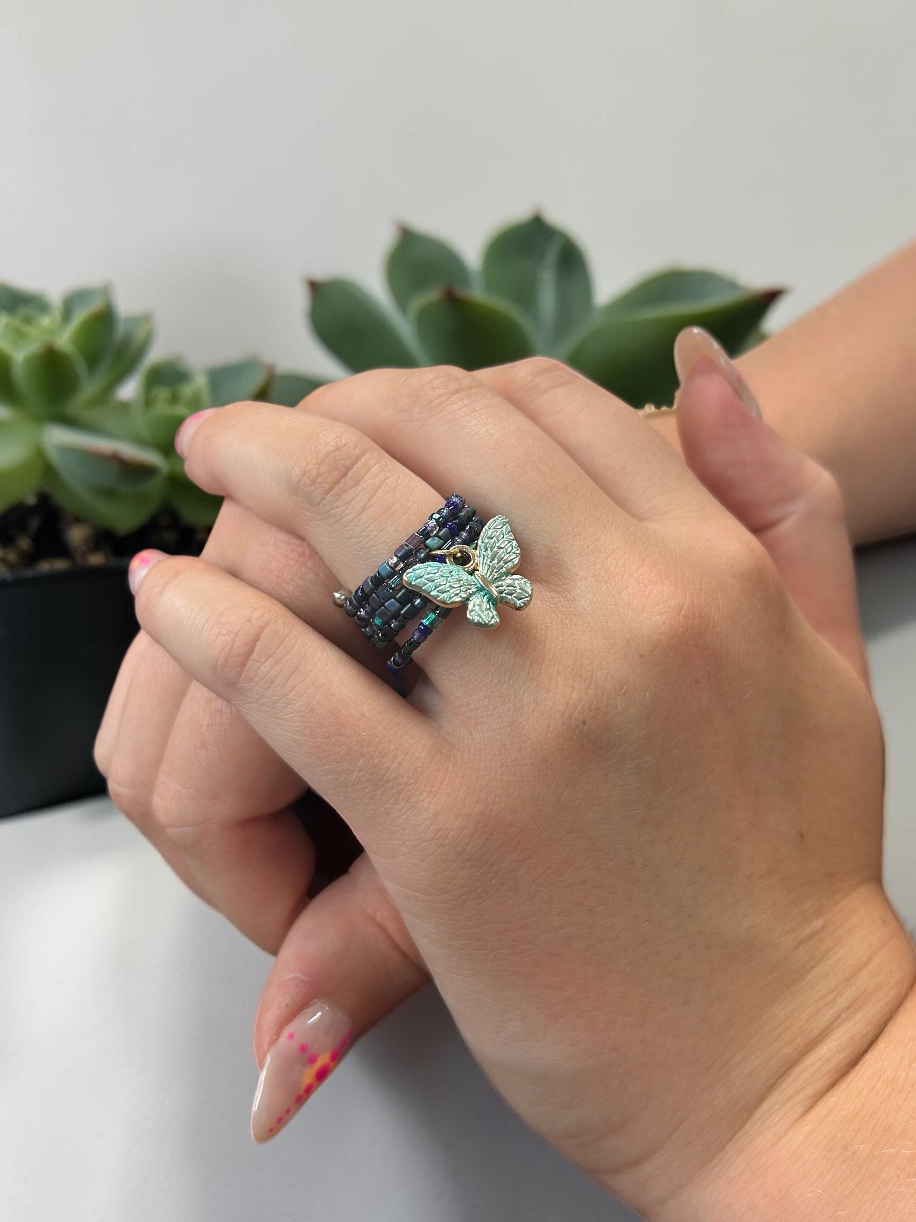 Iridescent Deep Multicolored Beaded Spiral Ring with Aqua Butterfly Charm | Unique Handmade Jewelry