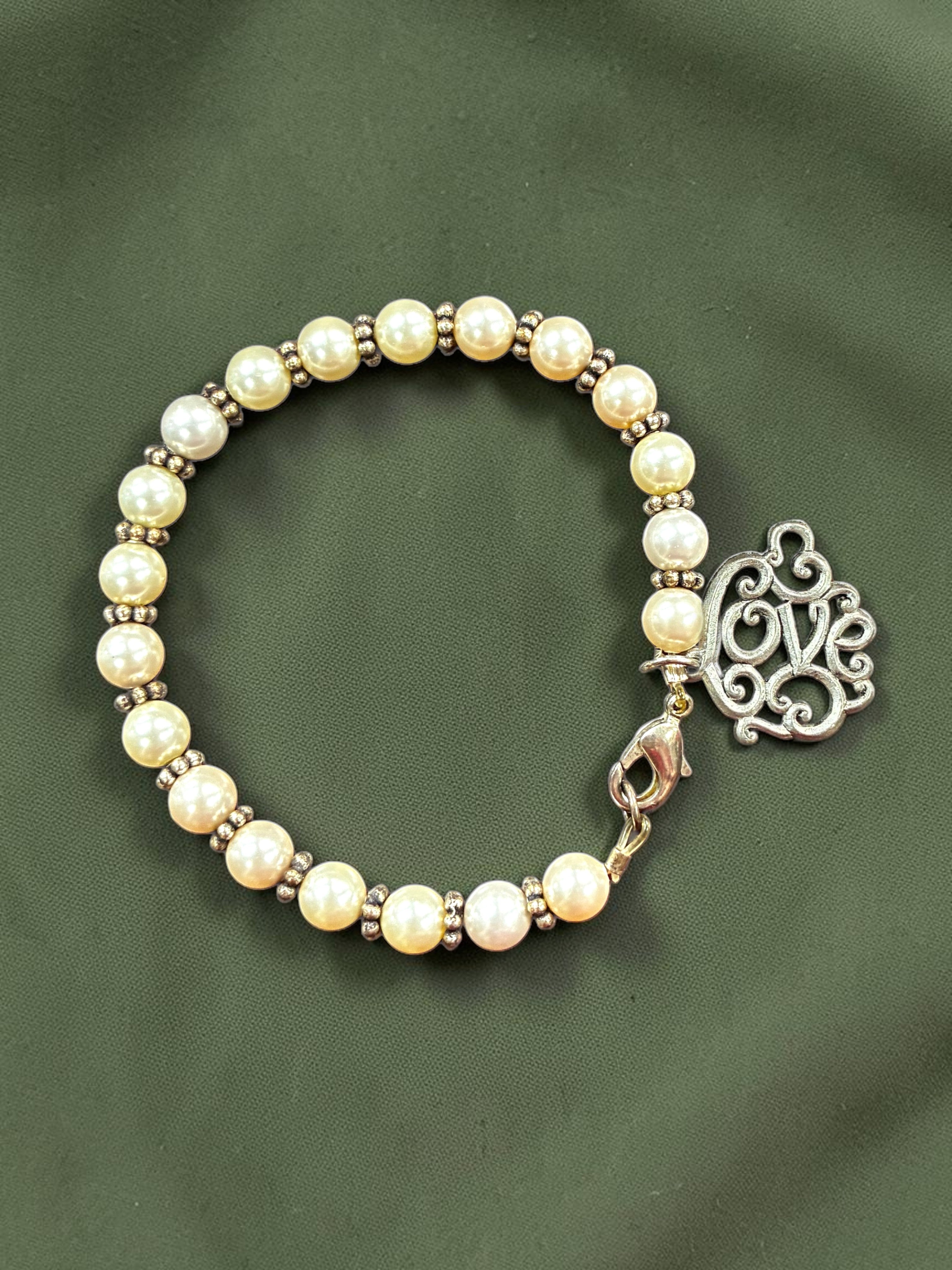 Elegant Pearl Charm Bracelet with Decorative Love Pendant